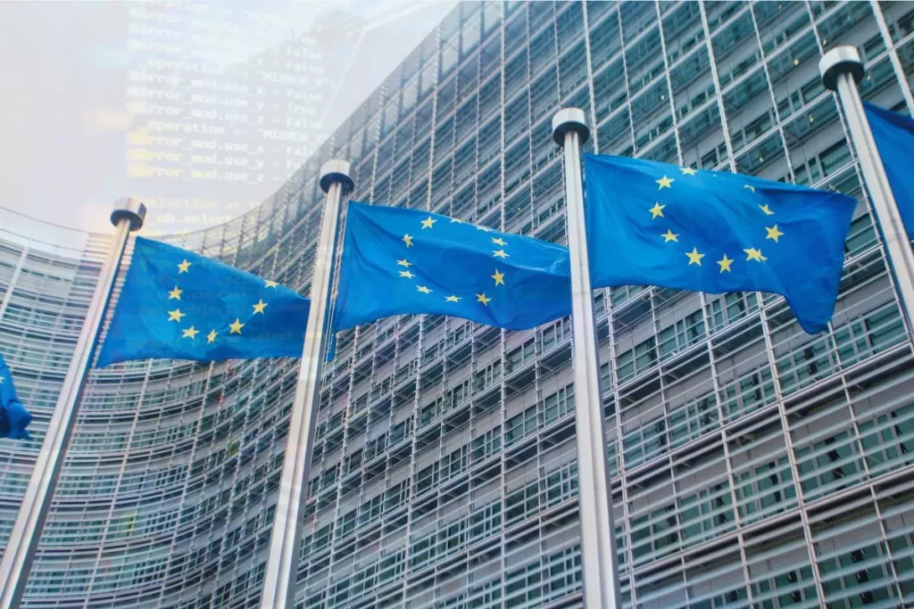 EU-Flaggen mit einem Programm Code im Hintergrund EU-Flaggen-mit-programm-code-bild-nis-2